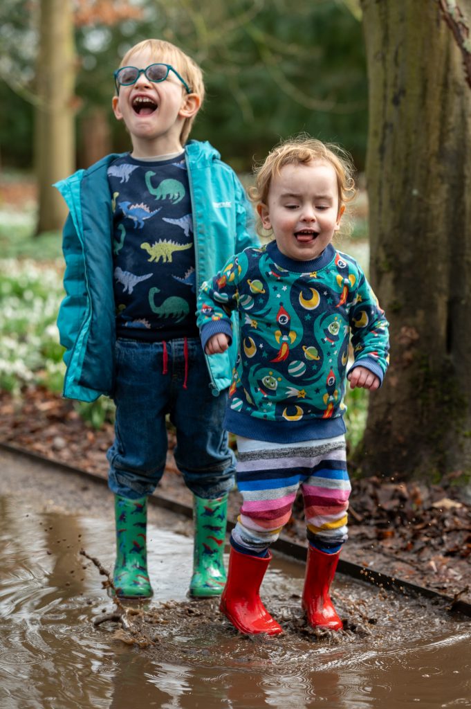 Bonnie and Linden jumping in puddles